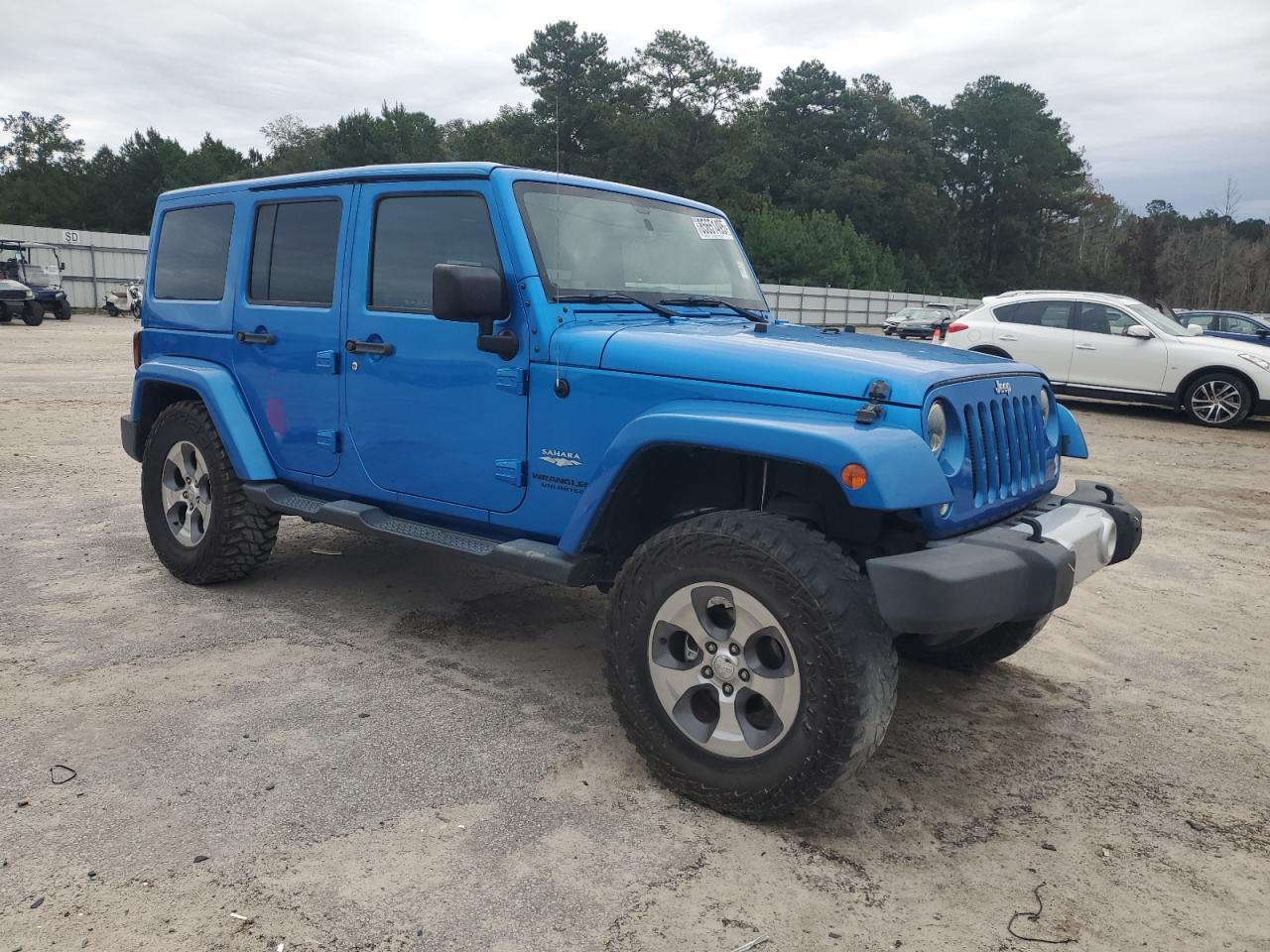 2015 Jeep Wrangler Unlimited Sahara - Фото 4