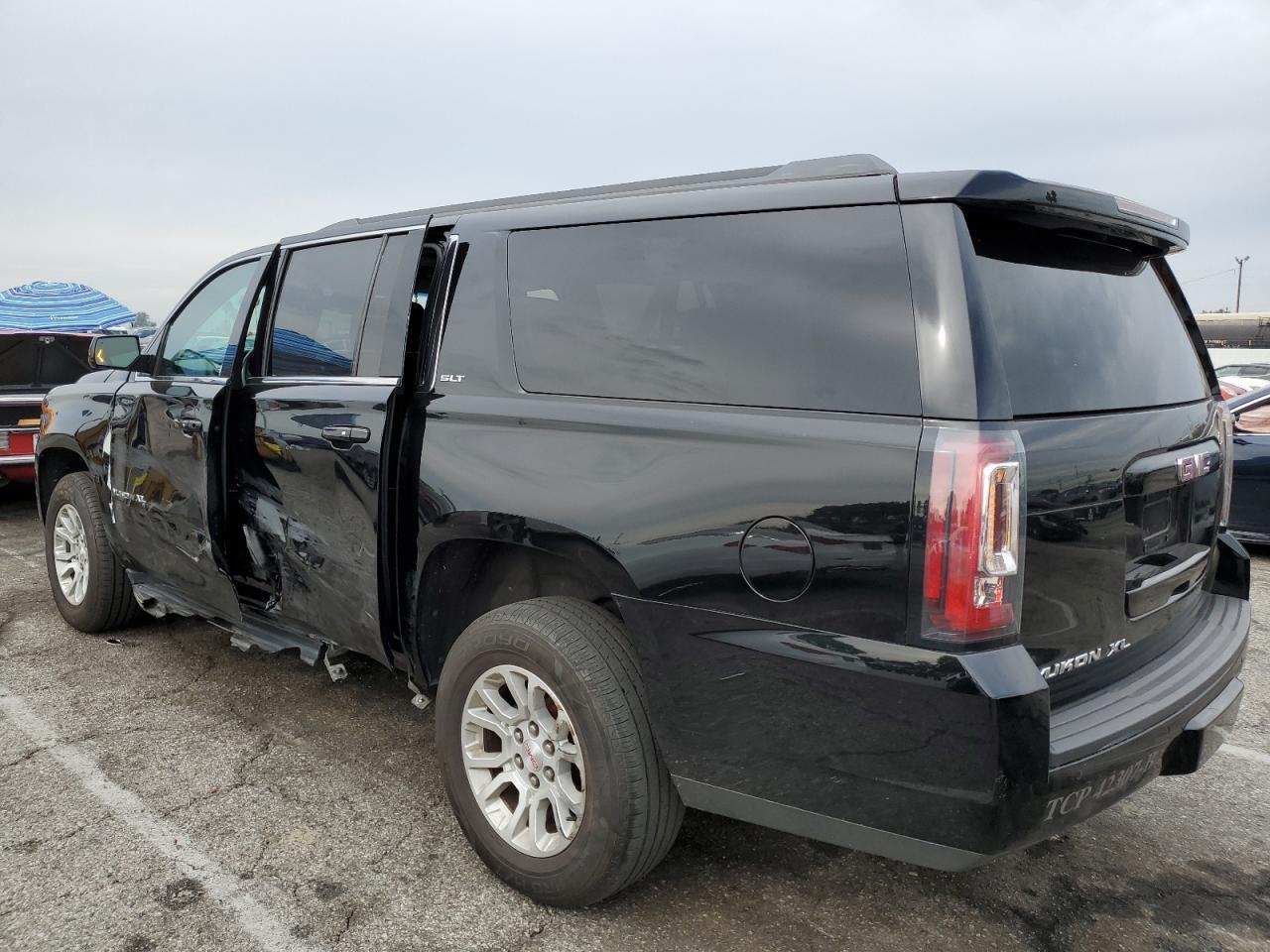 2019 GMC Yukon Xl C1500 Slt - Фото 2