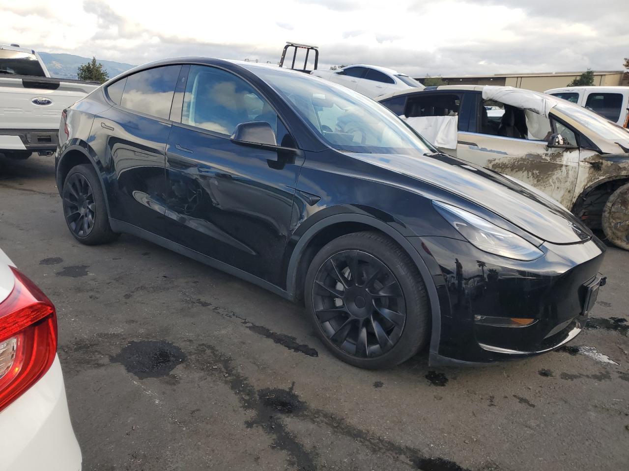 2024 Tesla Model Y - Фото 4