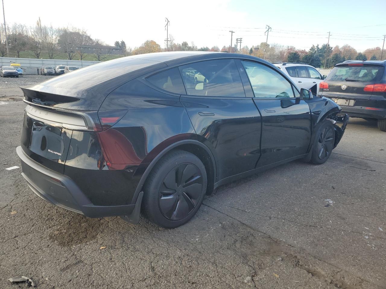 2026 Tesla Model Y - Фото 3
