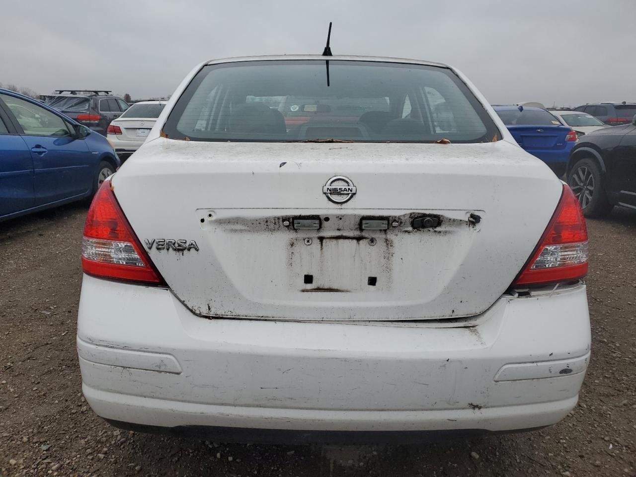 2011 Nissan Versa S - Фото 6