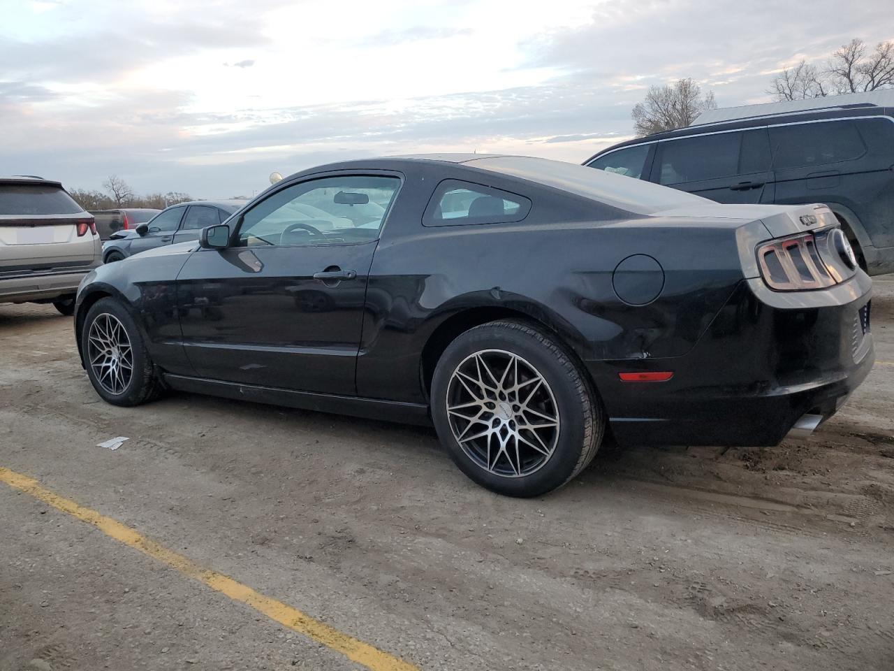 2014 Ford Mustang - Фото 2