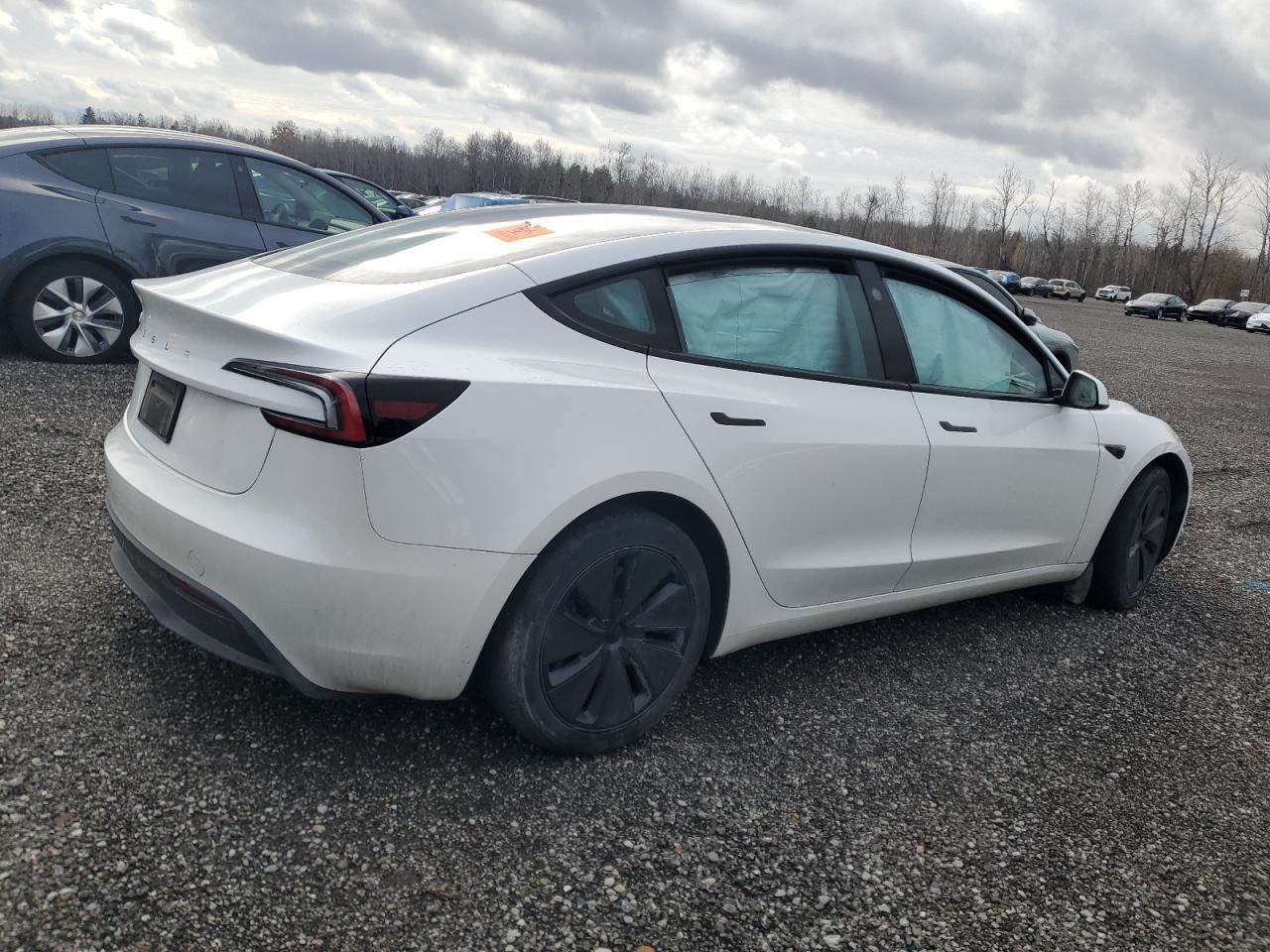2024 Tesla Model 3 - Фото 3