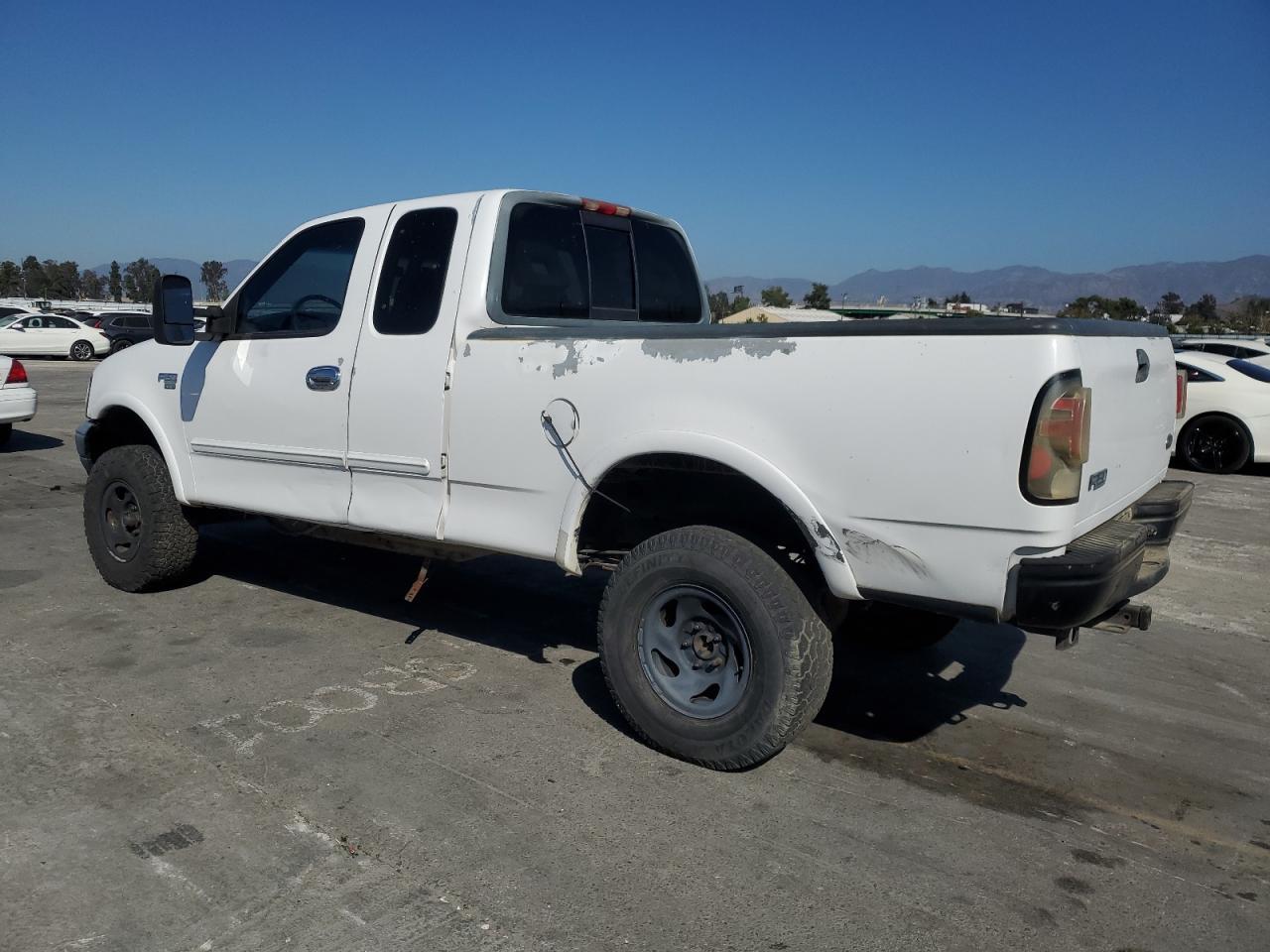 1999 Ford F150 - Фото 2