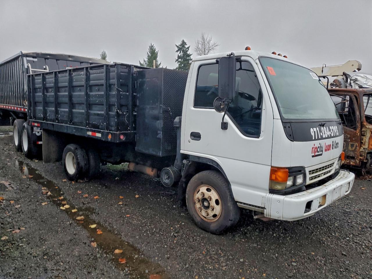 1999 Isuzu Npr Dump Truck - Фото 4