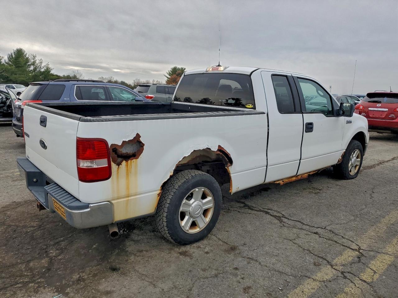 2004 Ford F150 - Фото 3