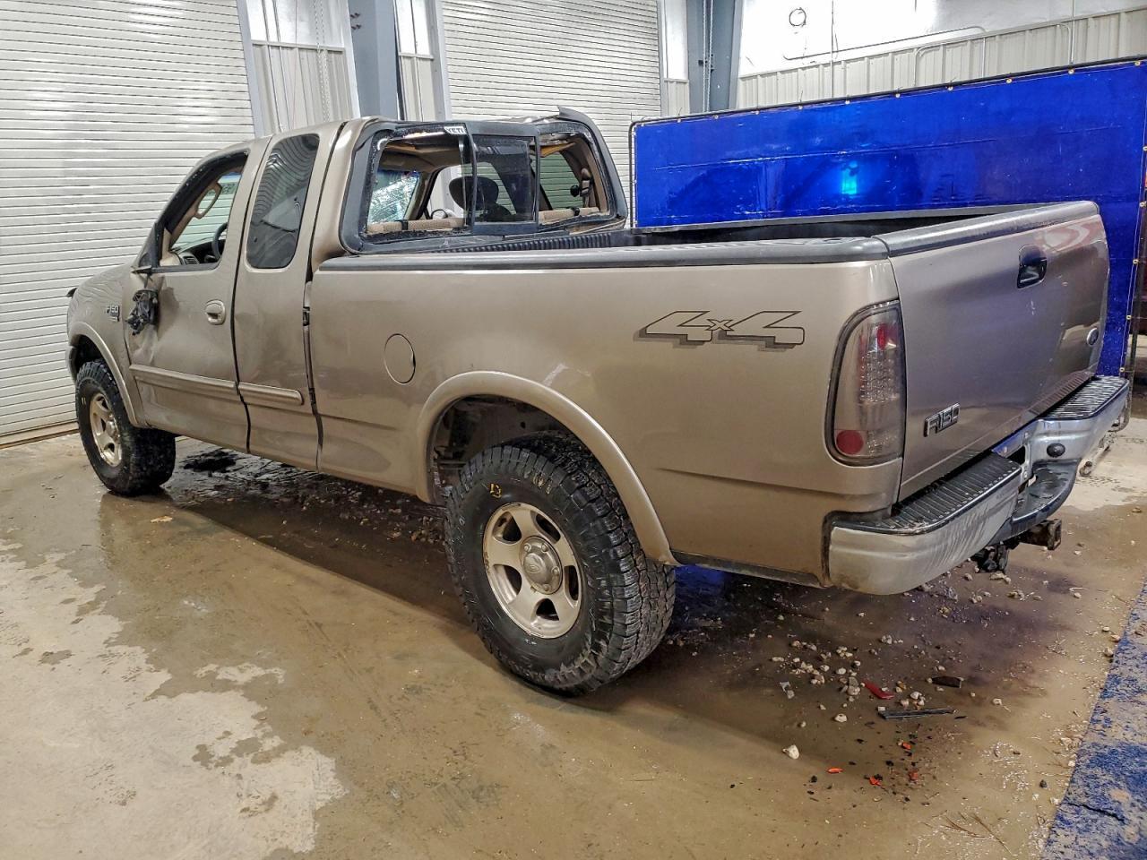 2003 Ford F150 - Фото 2