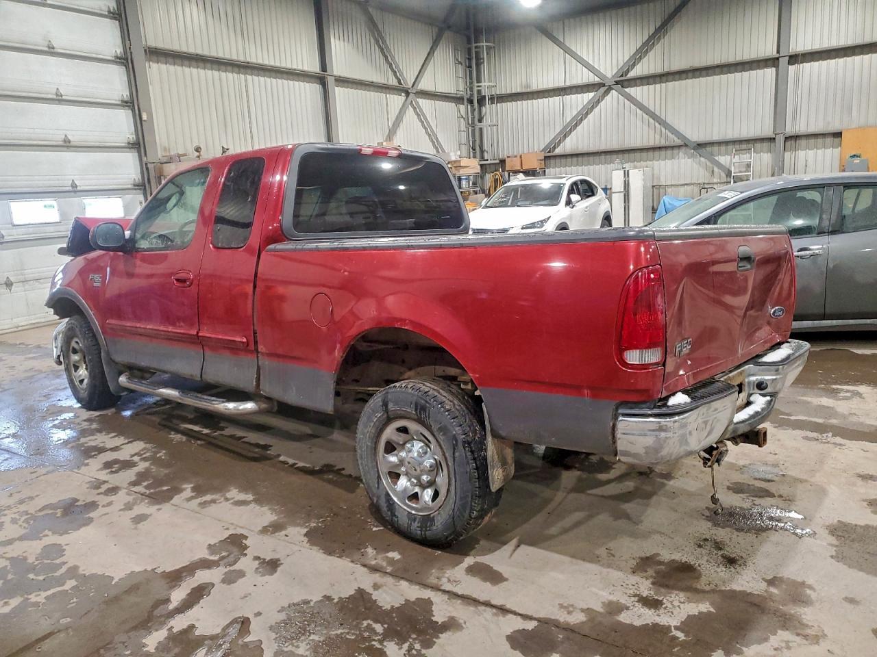 2003 Ford F150 - Фото 2