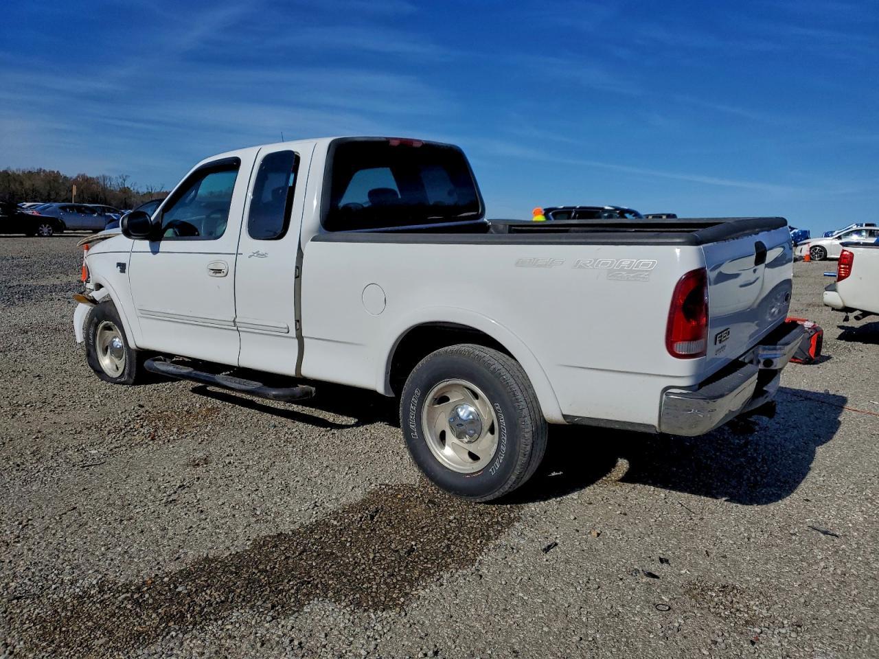 2001 Ford F150 - Фото 2