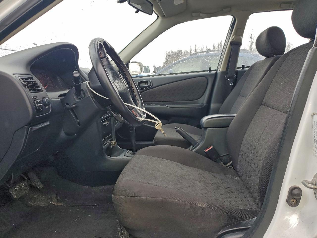 2002 Toyota Corolla Ce - Фото 7