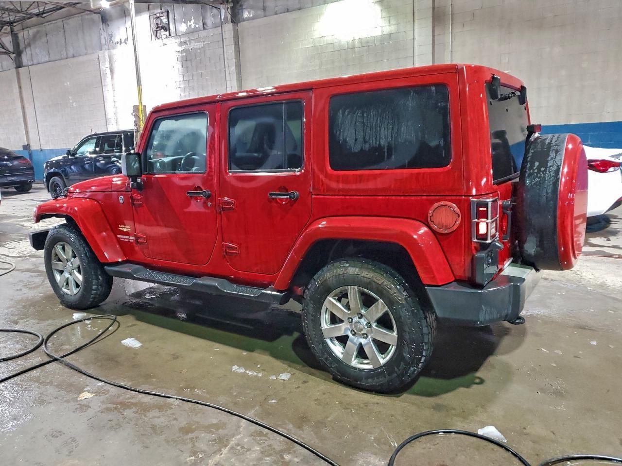 2012 Jeep Wrangler Unlimited Sahara - Фото 2